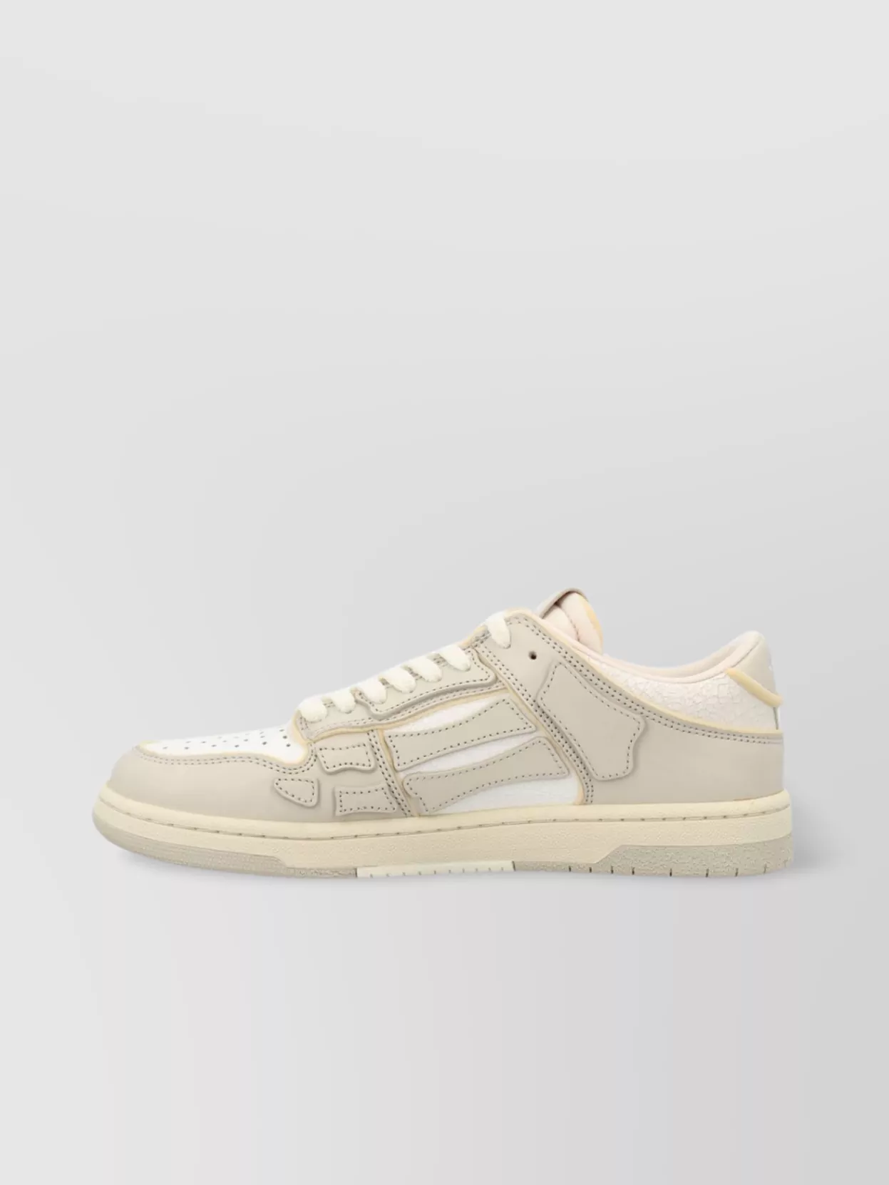 Amiri   Low top leather sneakers with panelled design